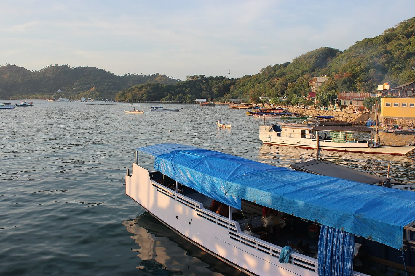 Boats and coastal scenery at Labuan Bajo waterfront, photographed in 2017
