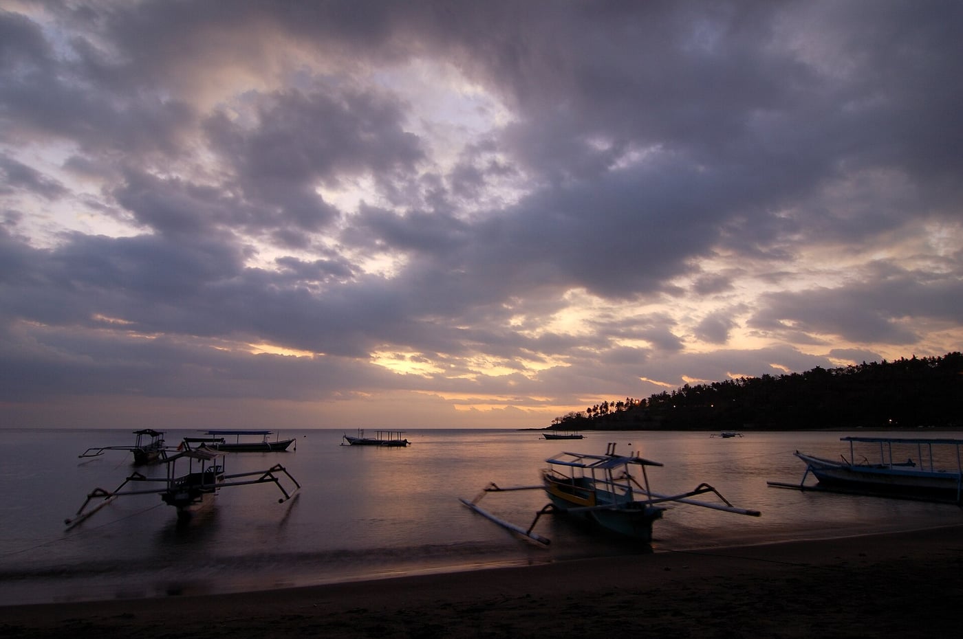 Sunset and outrigger boats at Senggigi Beach, photographed in 2007