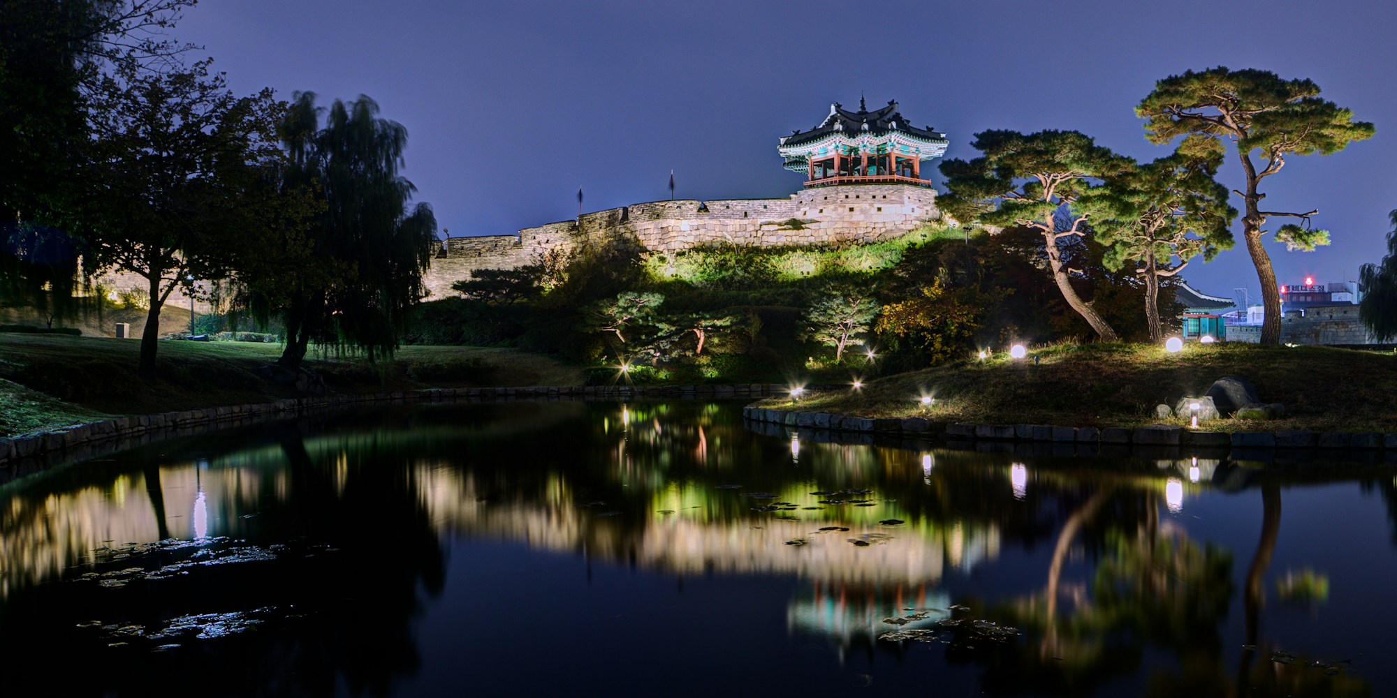 Banghwasuryujeong Pavilion reflected in Yongyeon Pond at night
