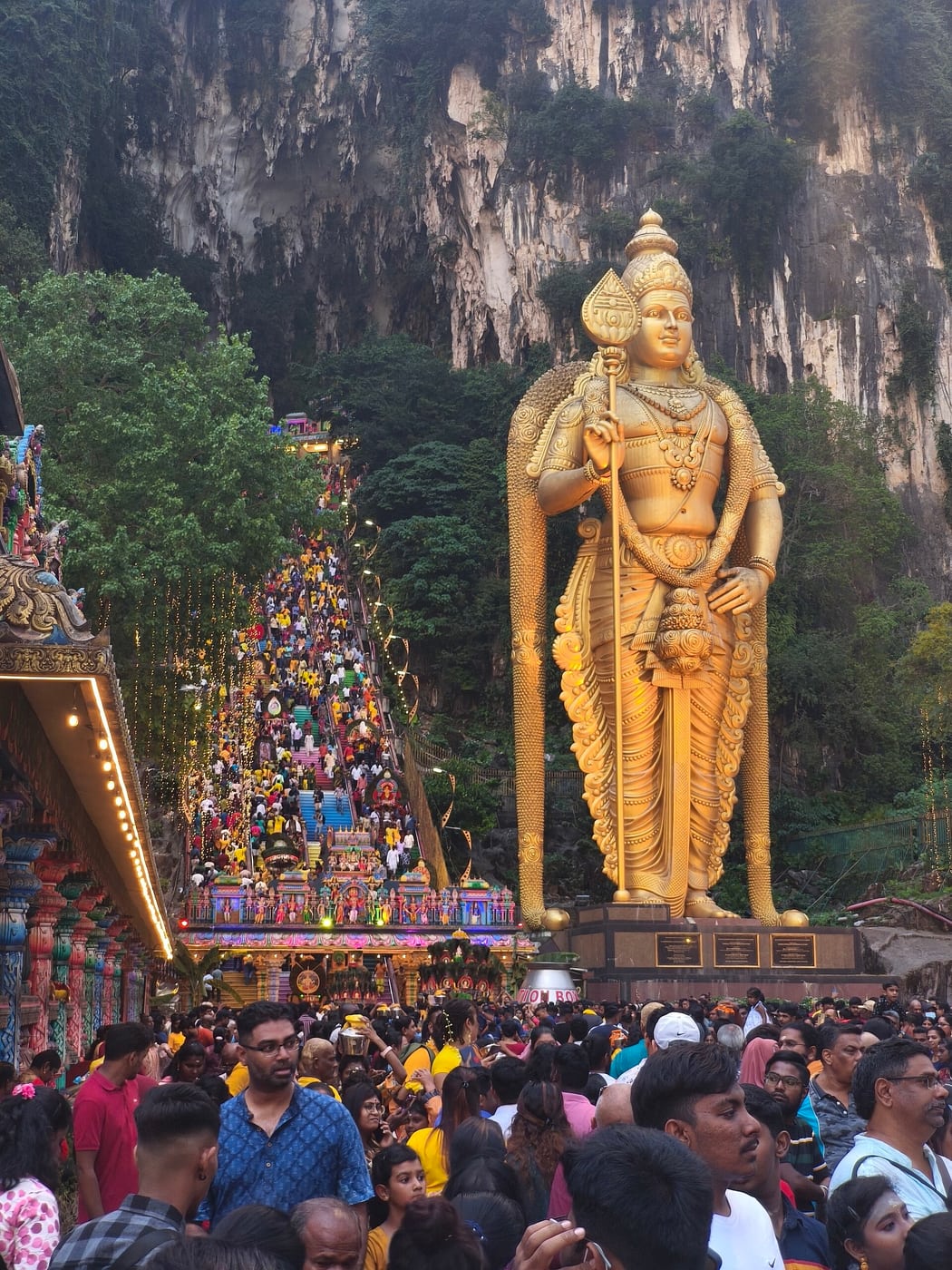 Batu Caves rainbow stairs and Murugan statue during Thaipusam (photographed in 2025)