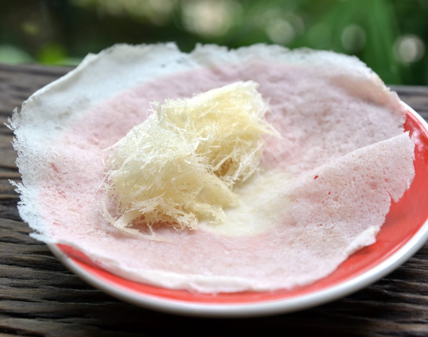 Roti sai mai snack reference: a thin pancake with candy floss, photographed in Chiang Mai.