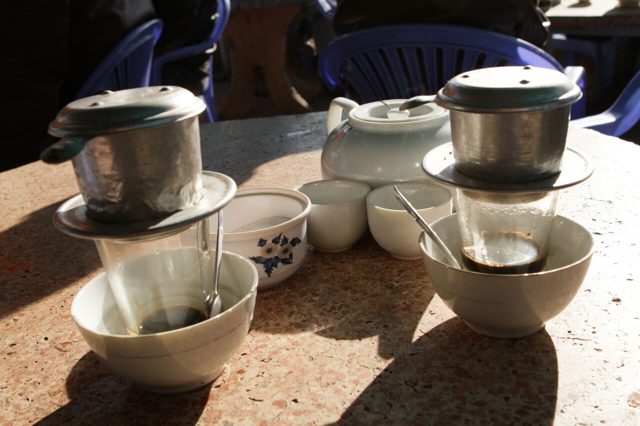 Phin-filter coffee photographed in Da Lat, a reference for the final morning cafe stop.