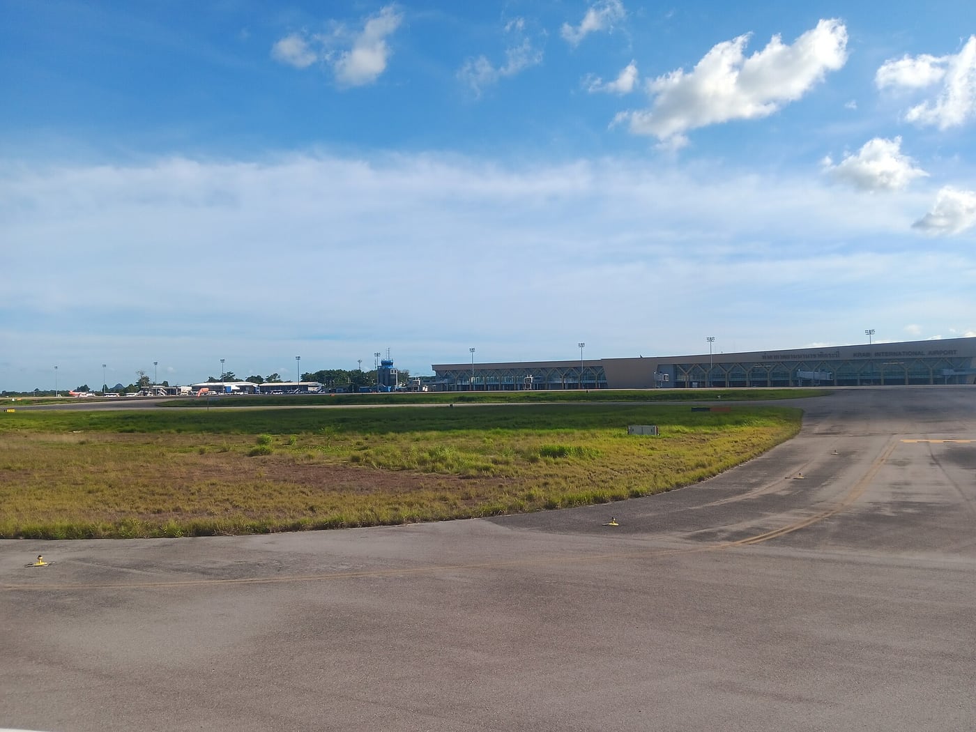 Krabi Airport terminal viewed from the airfield, 2024.