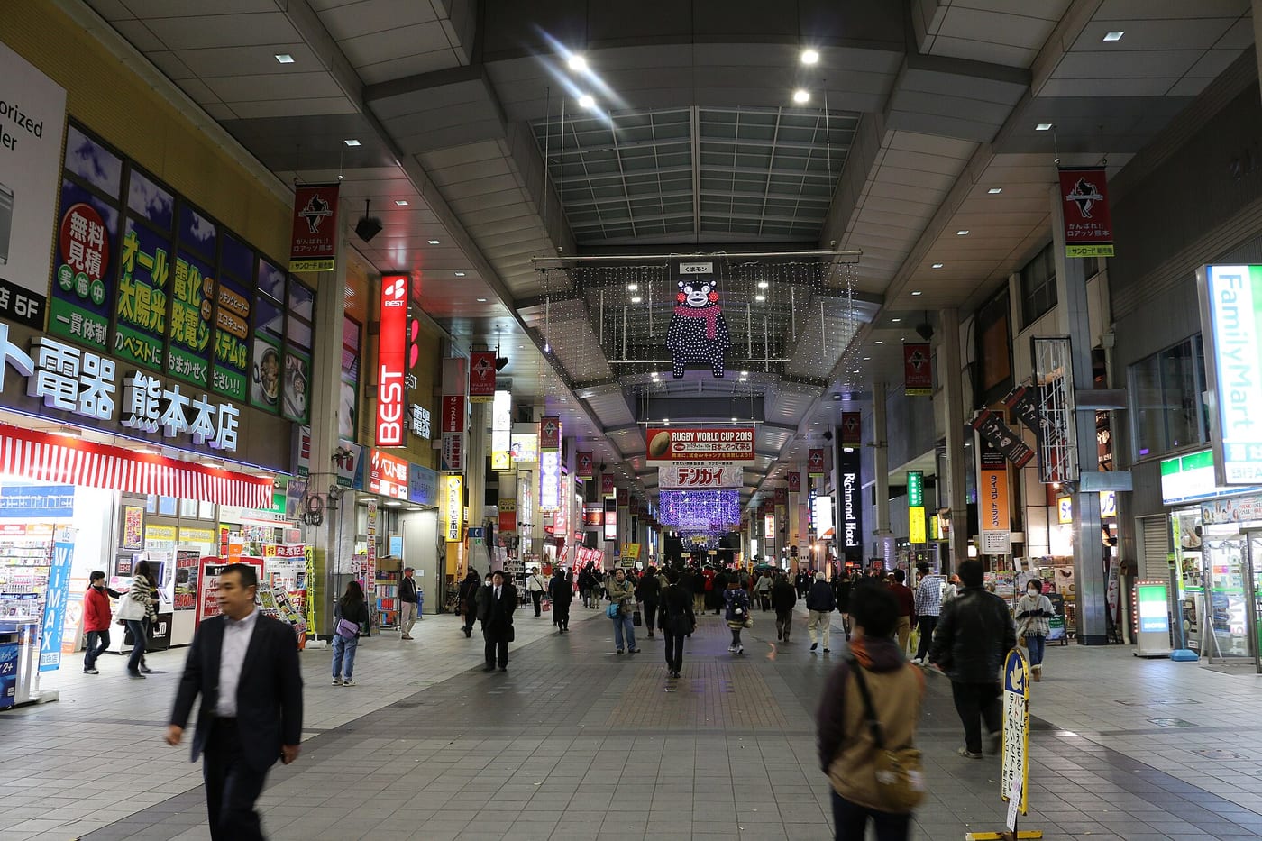 Shops and pedestrians along the covered Shimotori arcade in Kumamoto