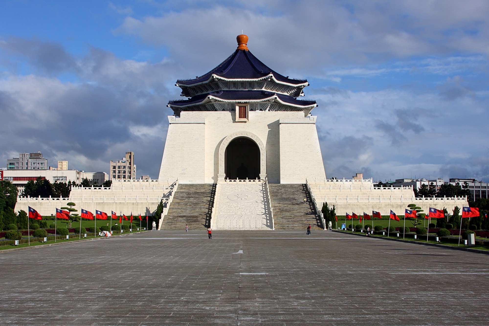 Chiang Kai-shek Memorial Hall and its broad plaza under blue sky